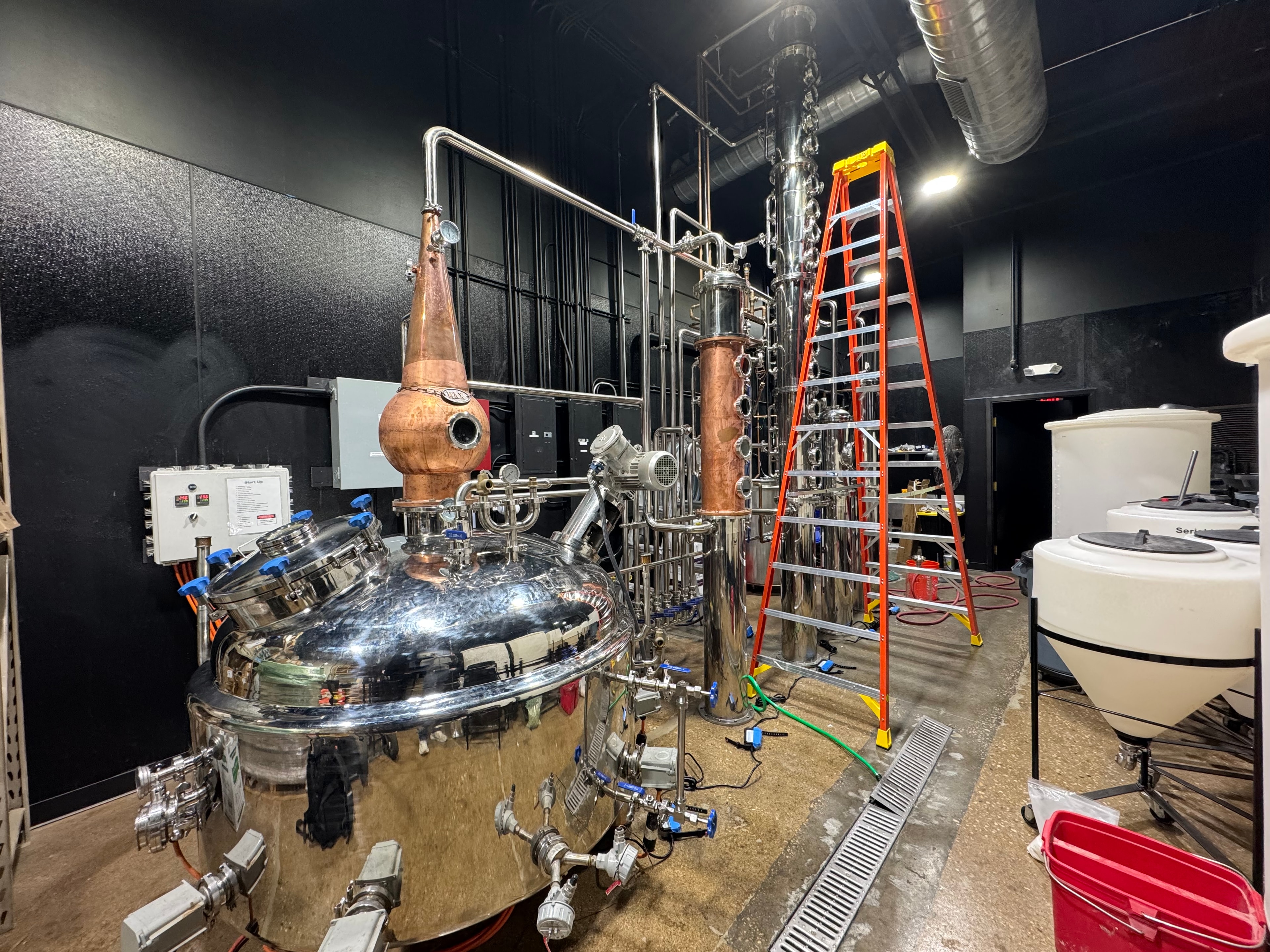 Copper still and perforated distillation columns with copper piping