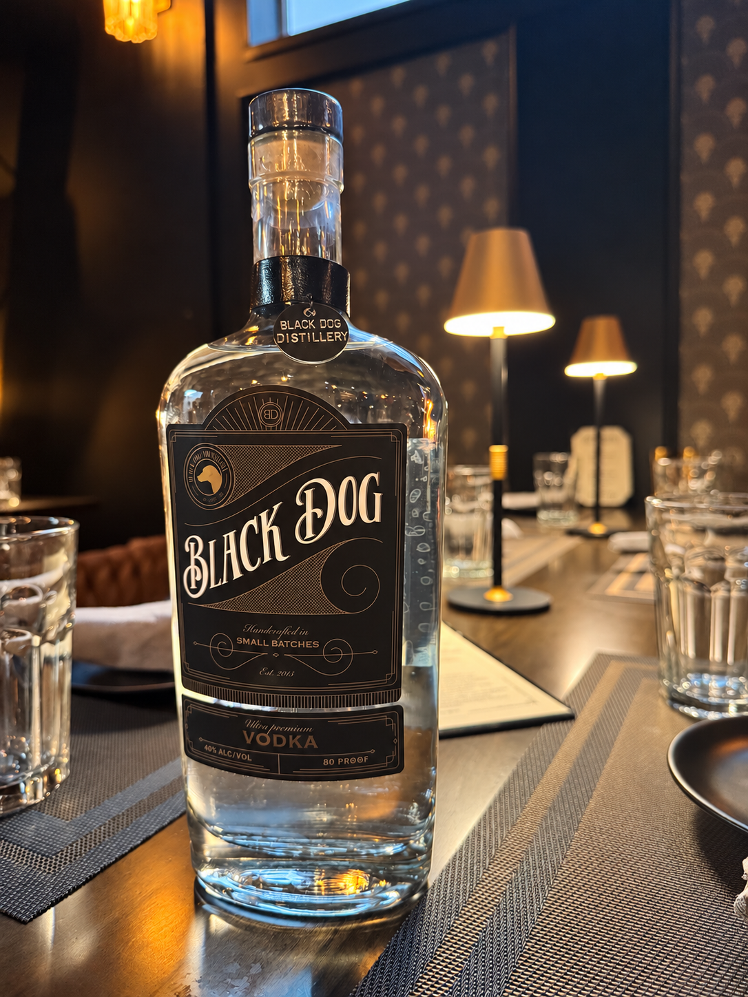 Black Dog Distillery spirit bottle presented on the bar
